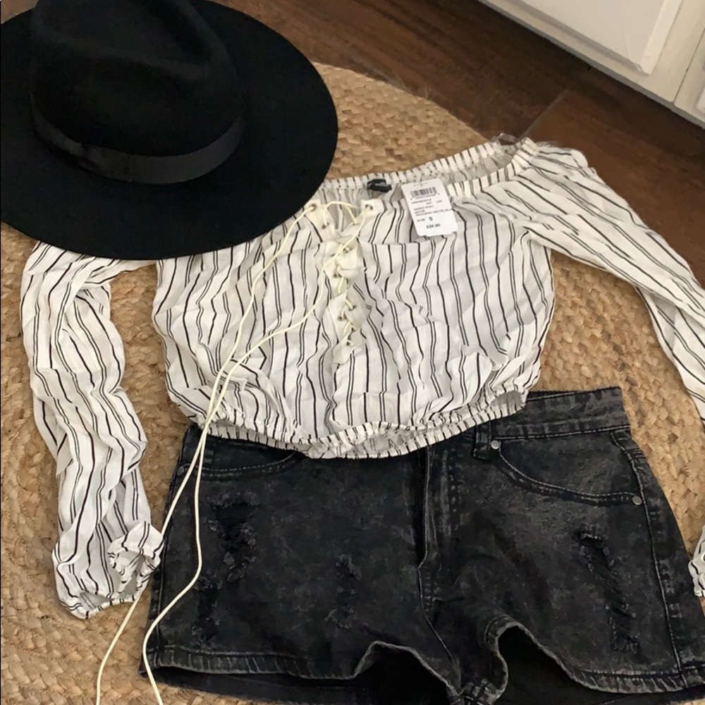 Shirt paired w black shorts